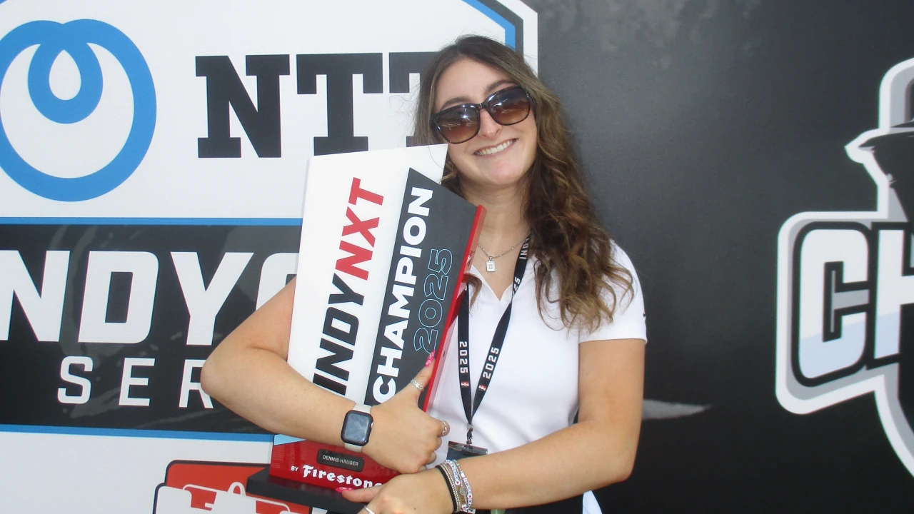 Emma Brodbar with the 2025 Indy NXT championship trophy