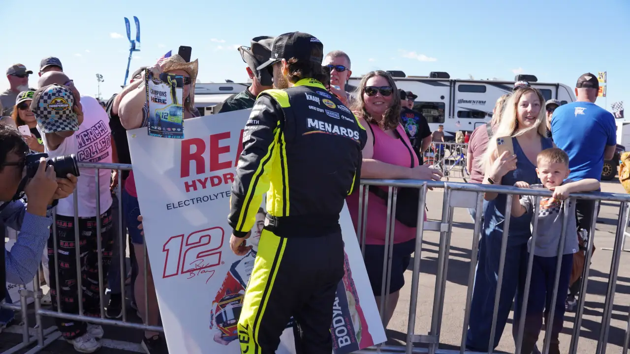 Ryan Blaney signing fan autographs