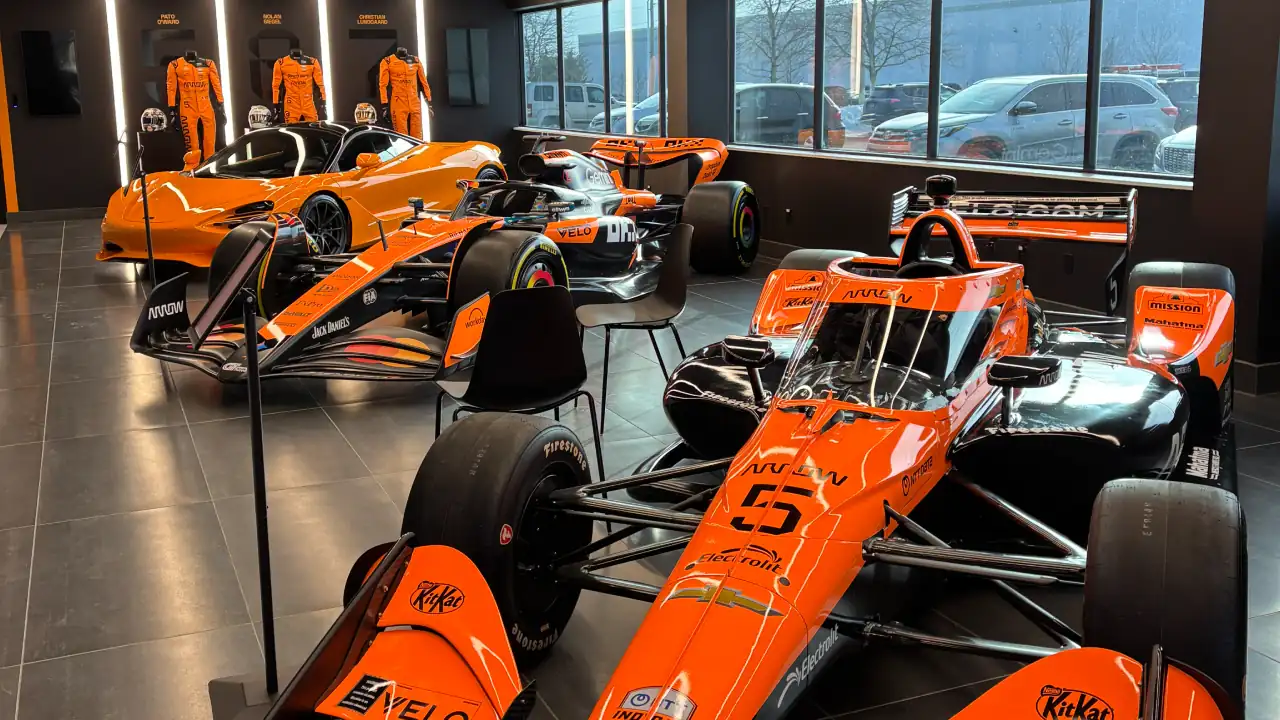 Pato O'Ward's 2025 IndyCar, Oscar Piastri's 2025 Formula 1 Car, McLaren Road Car in the McLaren Racing Center Lobby