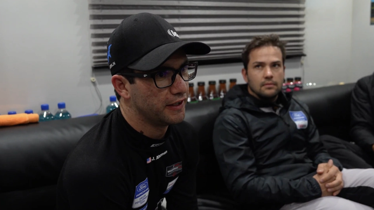 Jenson Altzman in the drivers debrief with the Myers Riley team at the 2026 Rolex 24