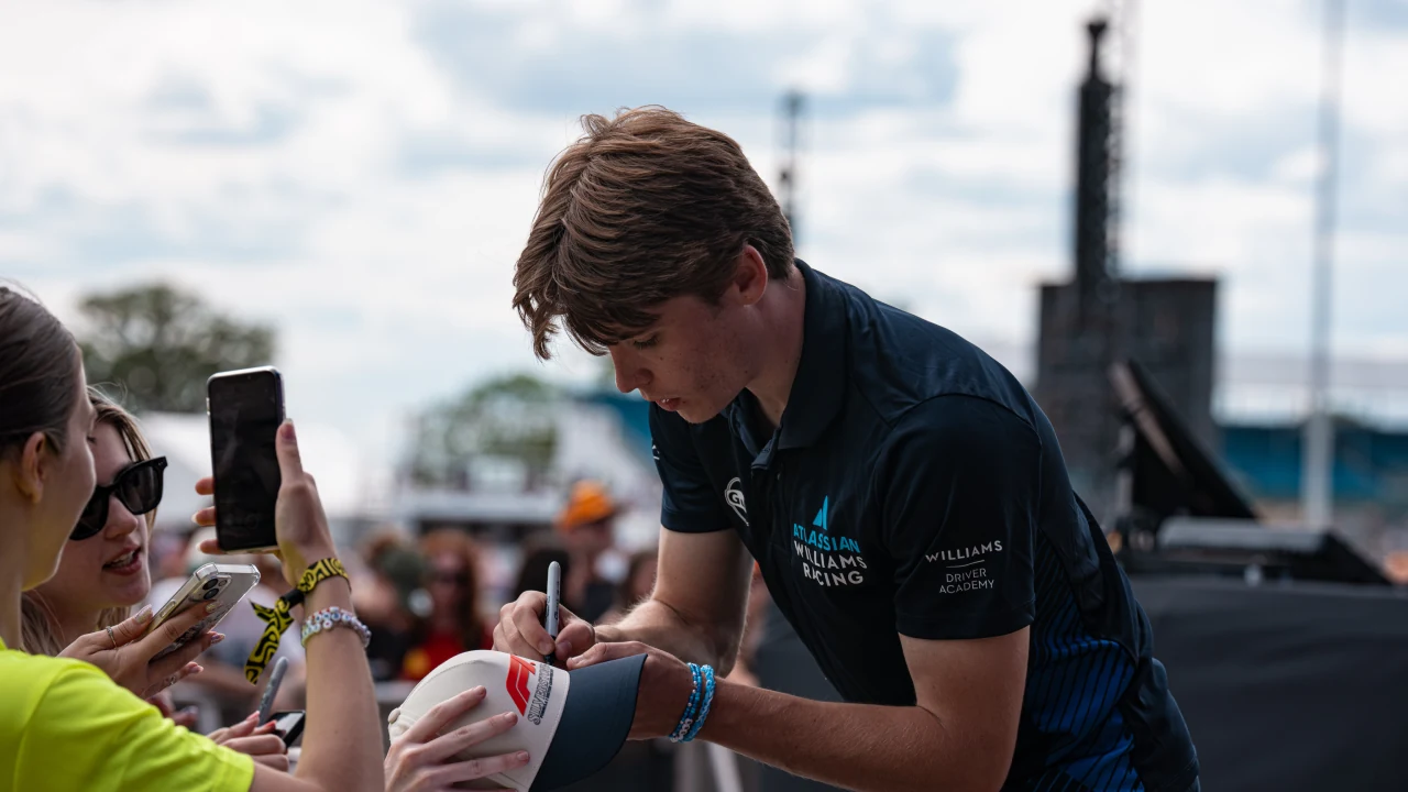 Luke Browning signing fan autographs at Silverstone Circuit