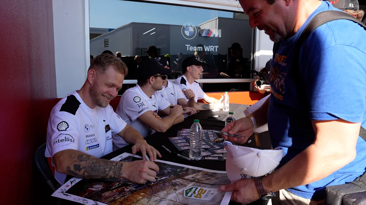 Kevin Magnussen signing autographs