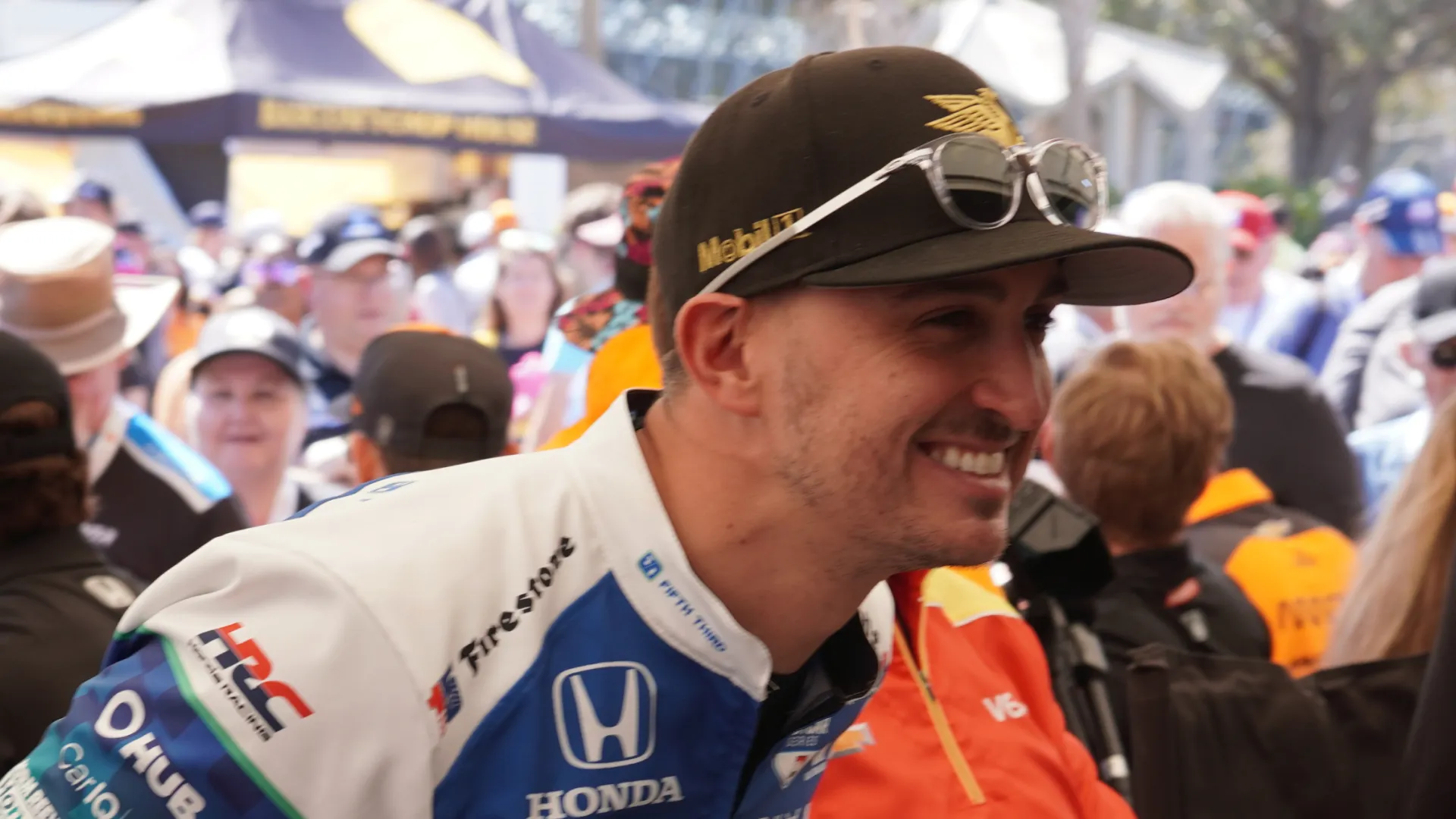 Graham Rahal doing a fan autograph signing