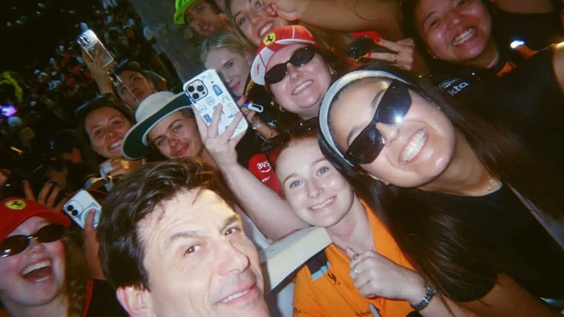 Toto Wolff poses with Bianca and other fans during the Melbourne Walk