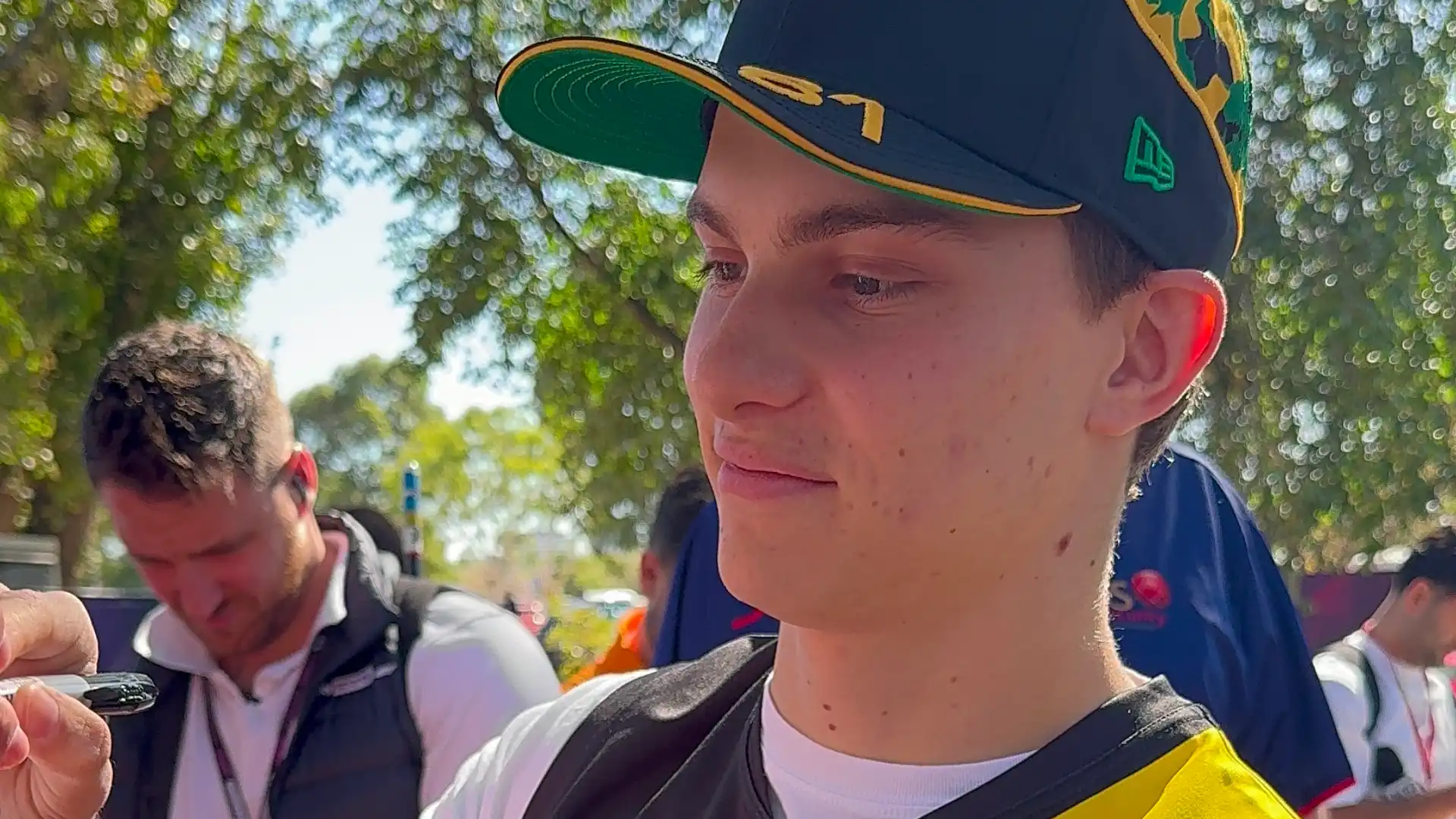 Oscar Piastri signing autographs during the Melbourne Walk