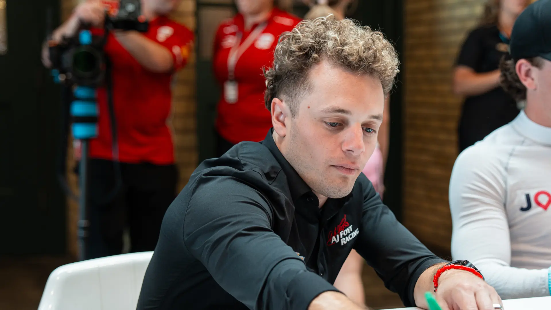 Santino Ferrucci signing autographs