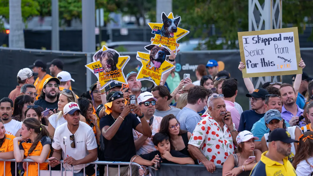 McLaren Racing Live fans holding signs