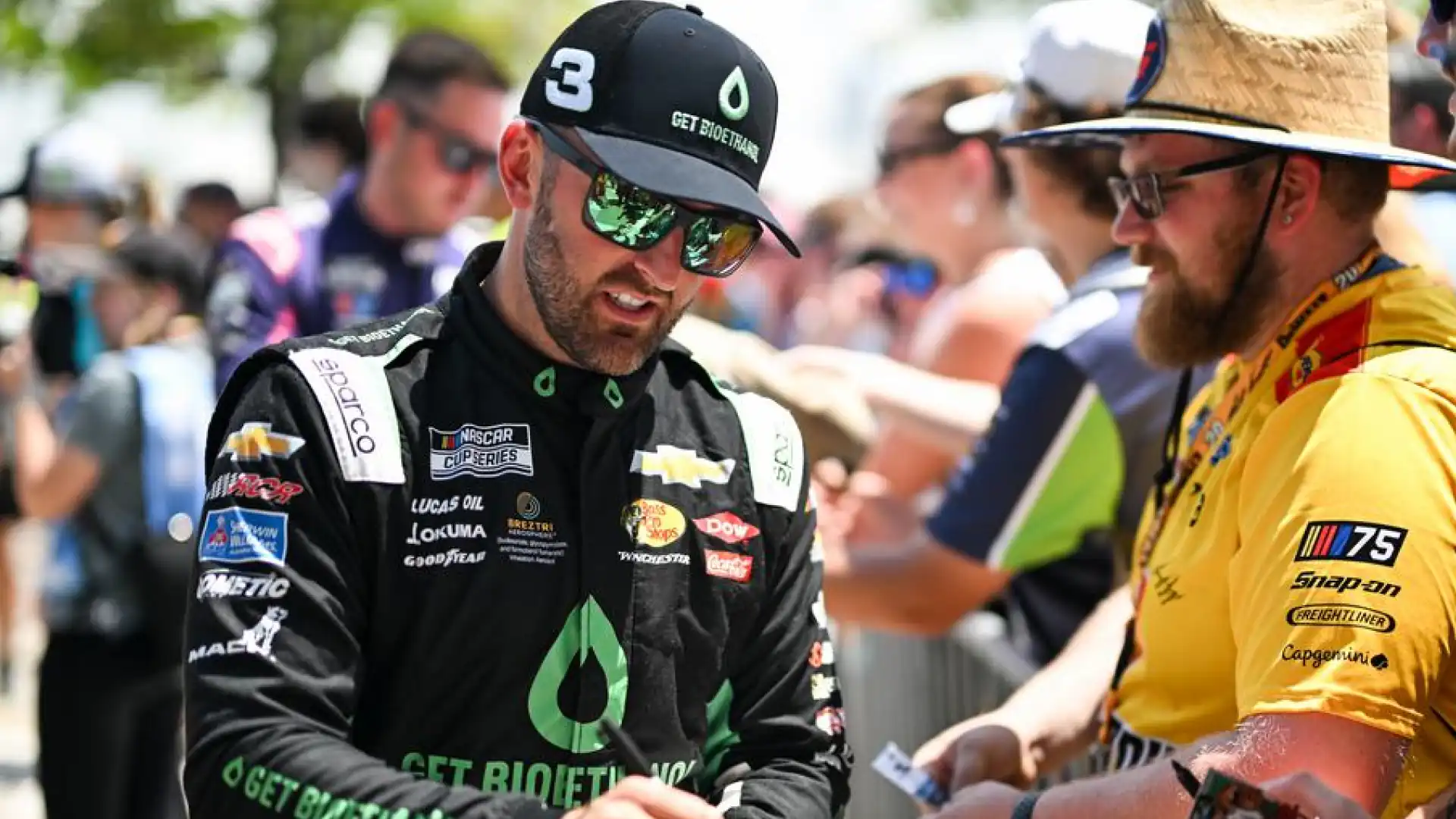 Austin Dillon signing fan autographs