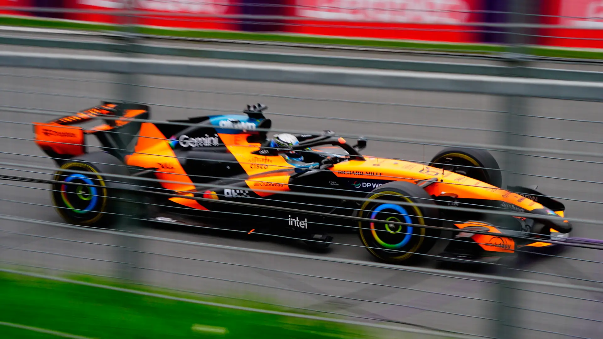 Oscar Piastri driving by a General Admission area at the Canadian Grand Prix