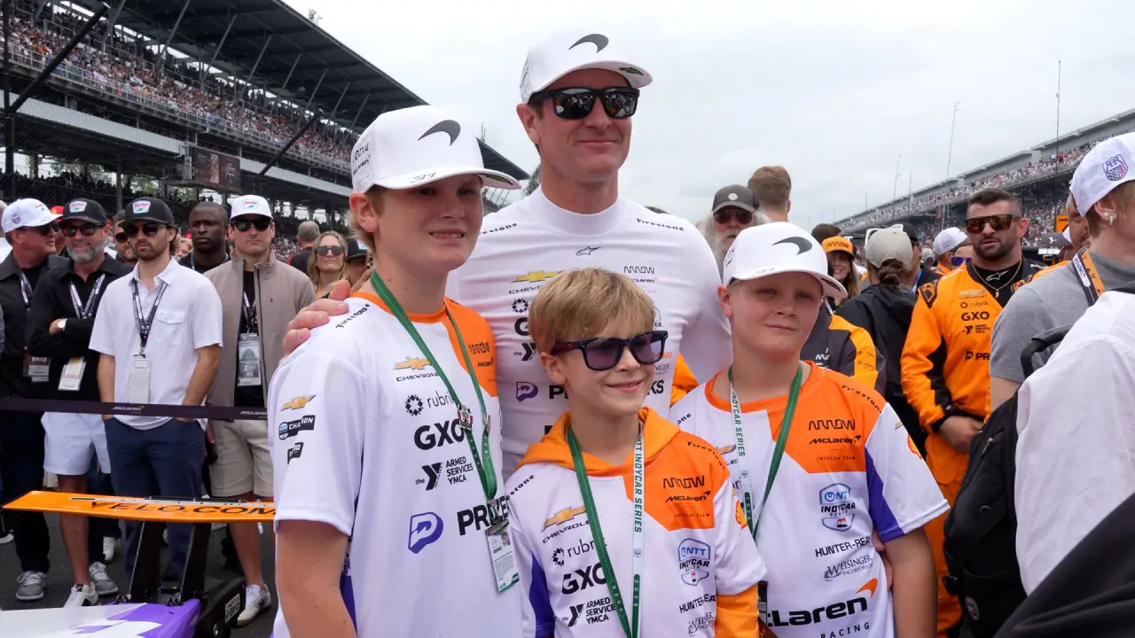 Ryan Hunter-Reay and his three sons on the grid ahead of the 2026 Indy 500