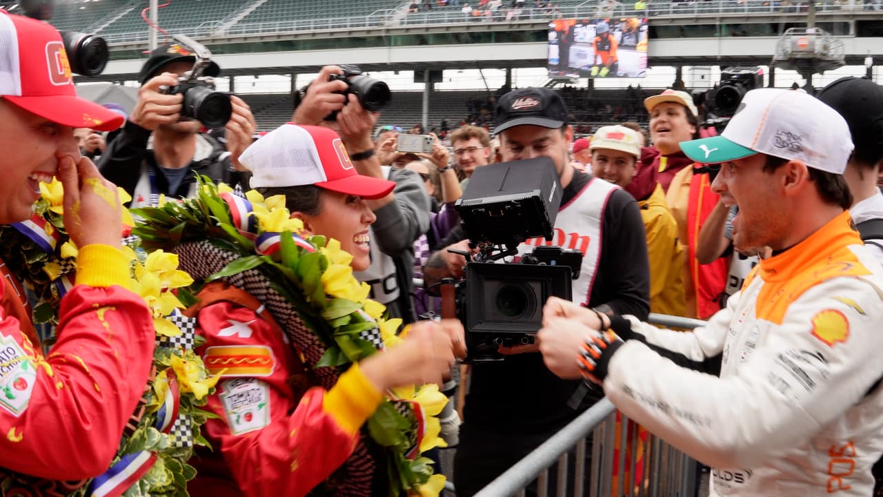 IndyCar driver Pato O'Ward congratulating Team New York Dog on their Wienie 500 win