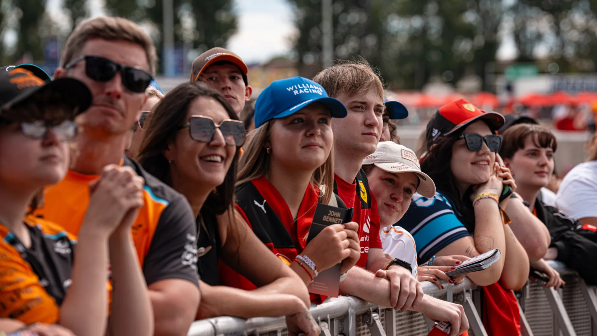 Formula 1 fans look toward the Fan Zone stage