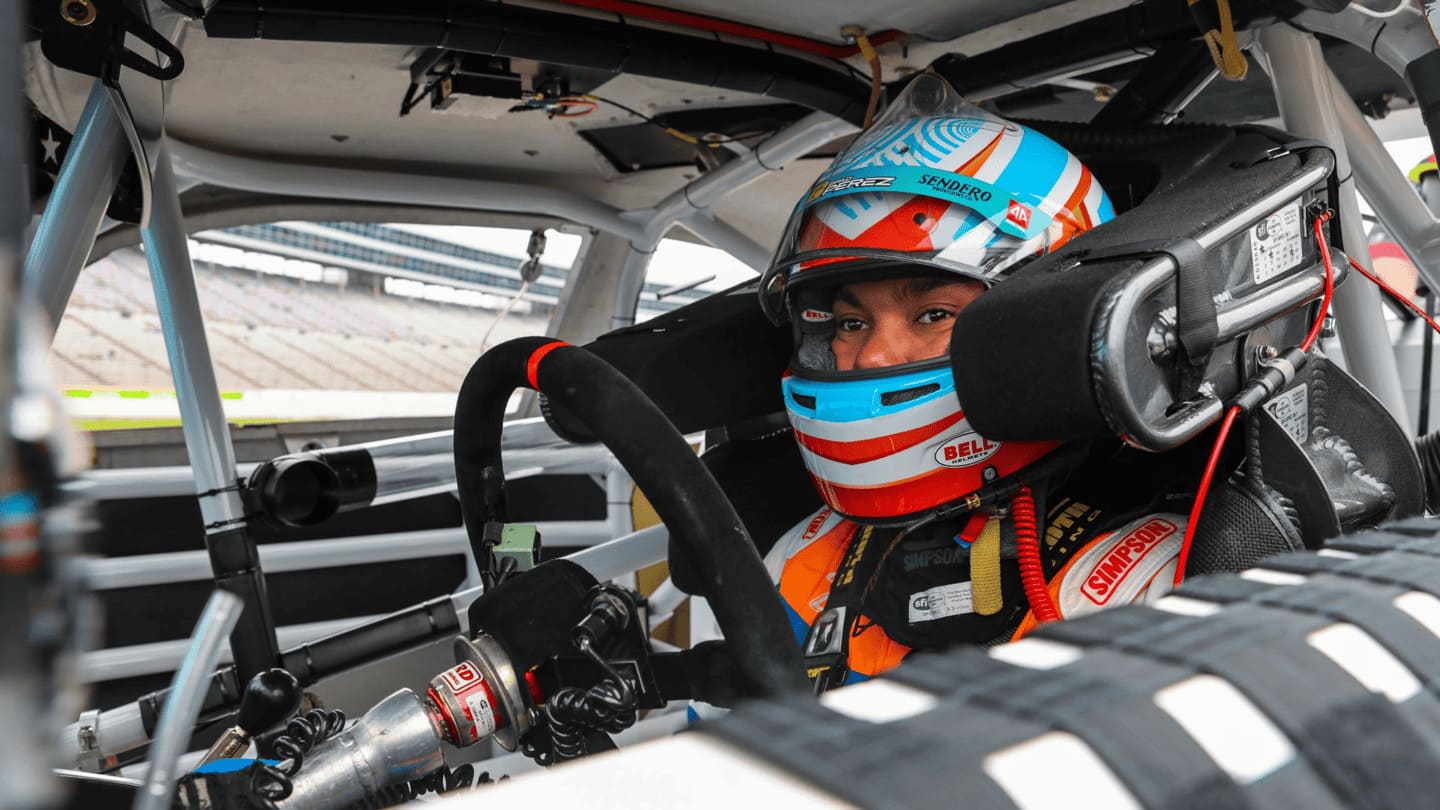 Brad Perez sits behind the wheel of his NASCAR O'Reilly Auto Parts Series stock car. (Photo: Daylon Barr)