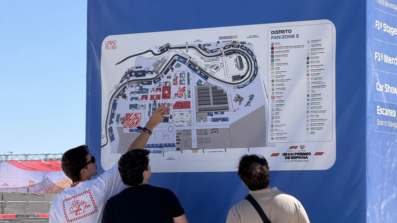 Fans look at a map of the Madring during the inaugural Spanish Grand Prix to be held at this circuit.