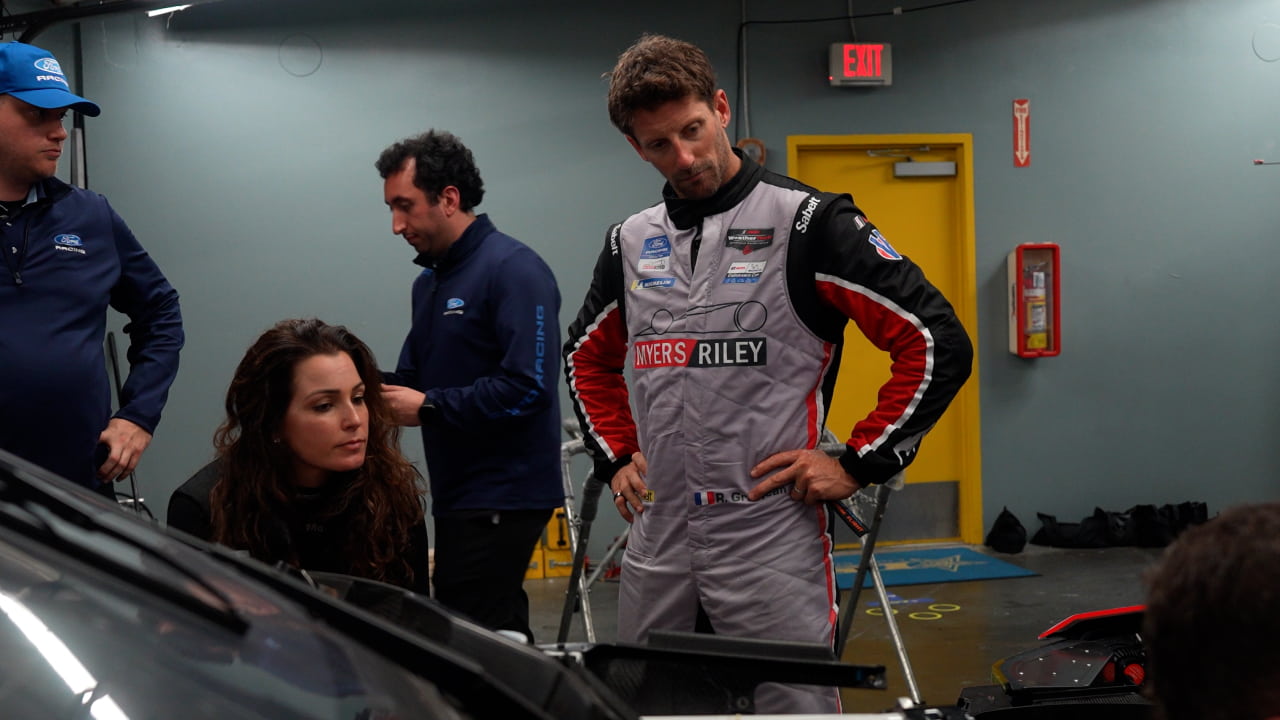 Romain Grosjean and Sheena Monk in the Myers Riley garage (Photo: Greg Kallman/FanAmp)