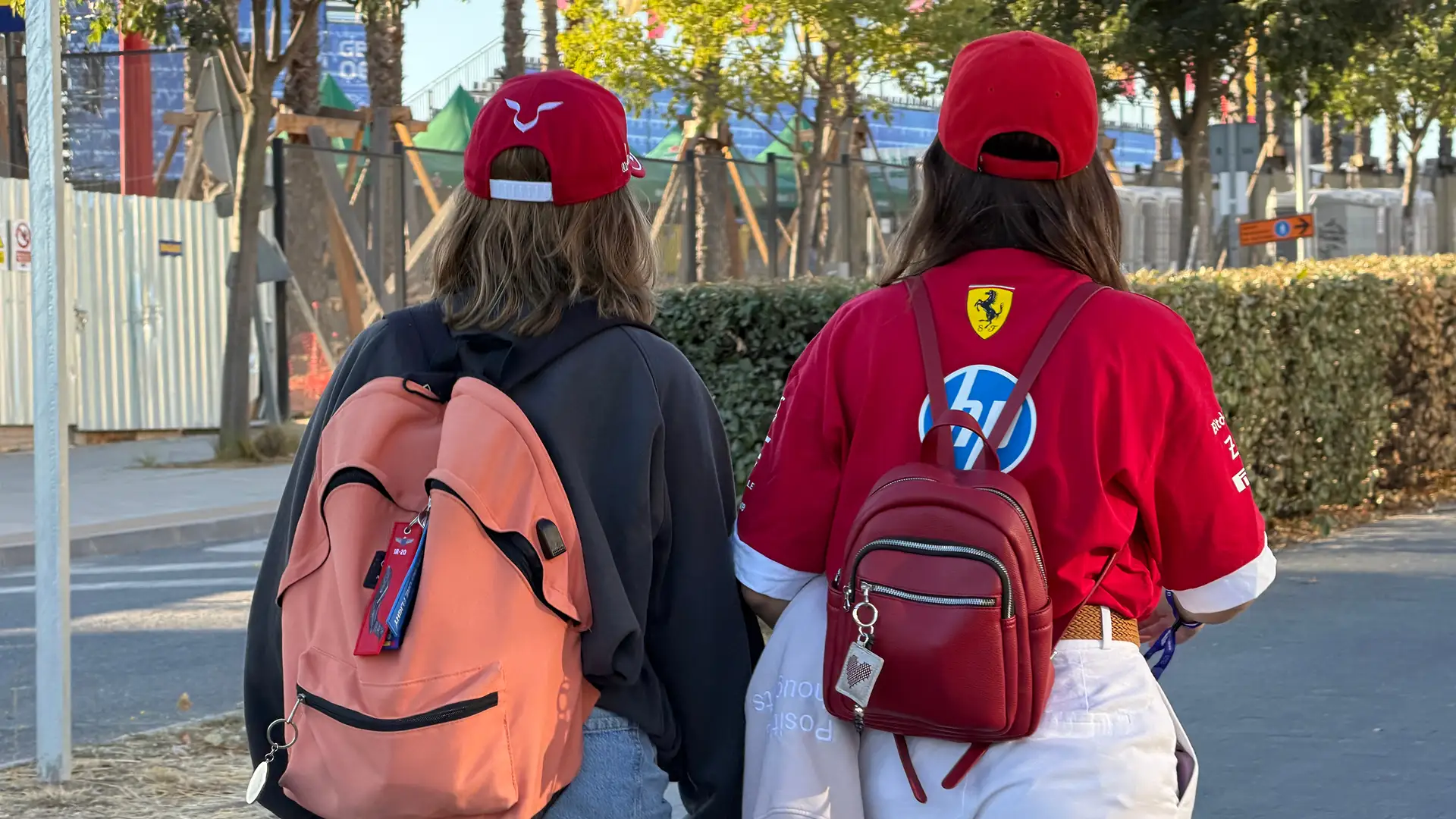 Two F1 Fans walking with backpacks (Photo: Ric Pacheco/FanAmp)