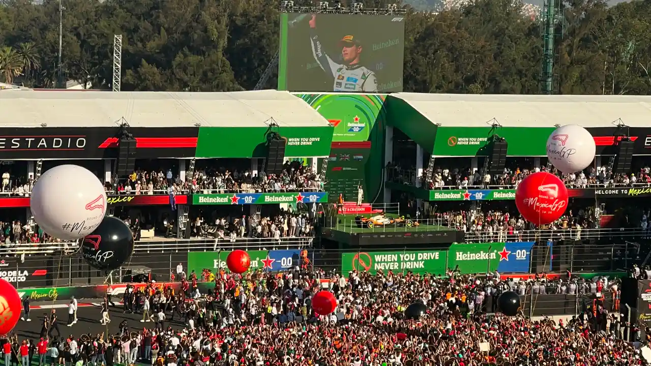 The post race track invasion and podium in 2025
