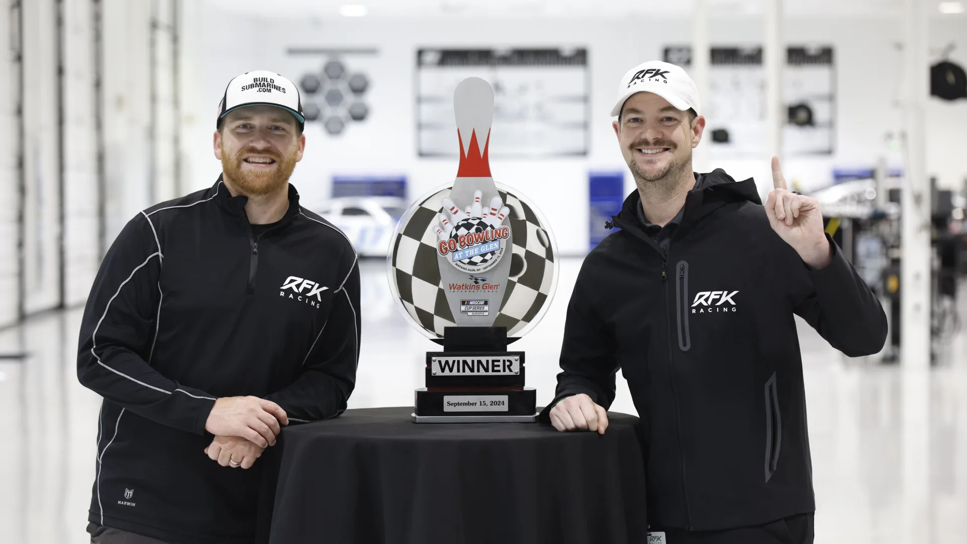 David Smith with the Go Bowling at the Glen winner's trophy