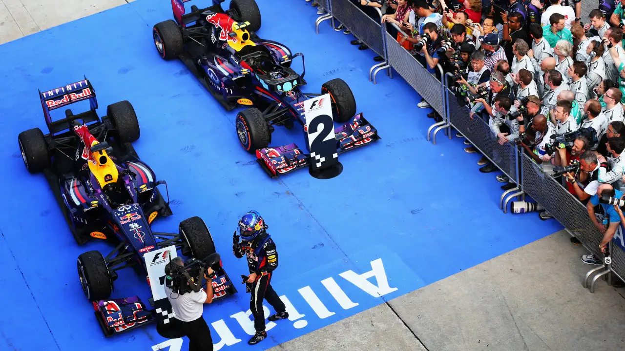 Parc fermé after the 2013 Malaysian Grand Prix, with Sebastian Vettel and Mark Webber’s F1 cars parked in the P1 and P2 spots, respectively. (Photo: Paul Gilham, Getty Images/Red Bull Content Pool)