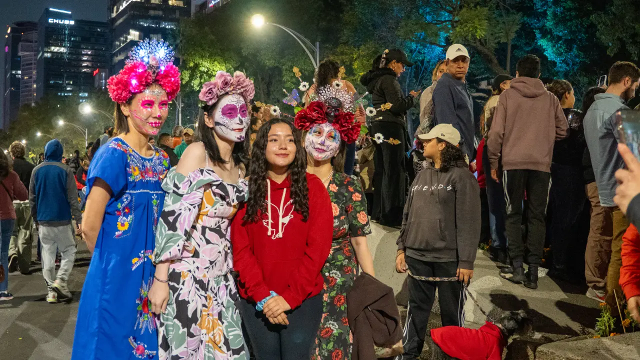 People celebrating during a Day of the Dead Parade in Mexico City (Photo: Greg Kallman/FanAmp)