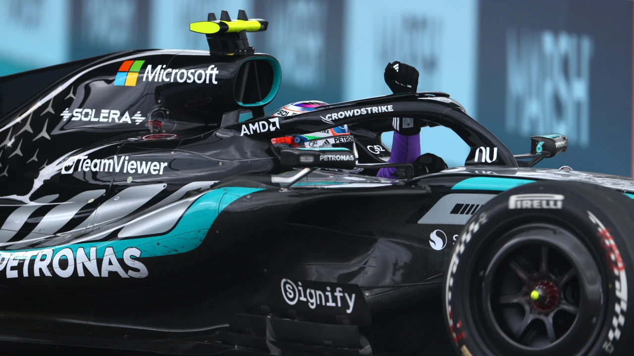 Kimi Antonelli driving past Marsh trackside signage as he celebrates his 2026 Miami Grand Prix win. (Photo: Mercedes-AMG PETRONAS F1 Team Media Center)