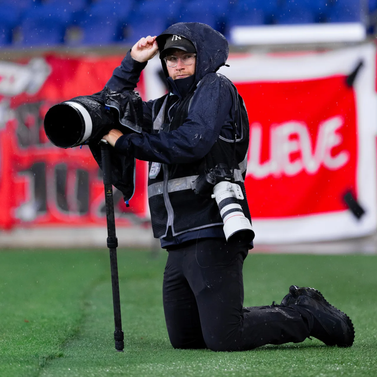 Jordan Bank braves the rain to capture the action from the sidelines. (Photo courtesy of Jordan Bank)