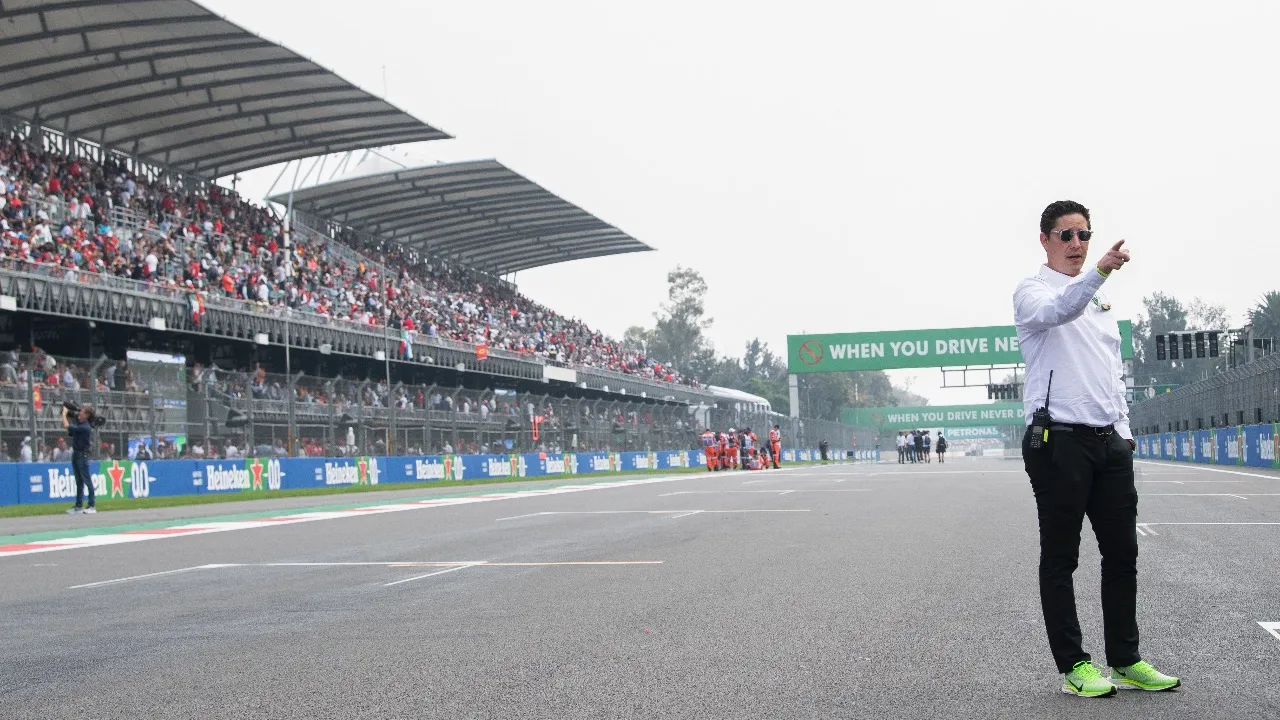 Rodrigo Sanchez standing on the starting grid at the Mexican Grand Prix, a race that has gone on to win five consecutive Promoter of the Year awards. (Photo courtesy of Rodrigo Sanchez)