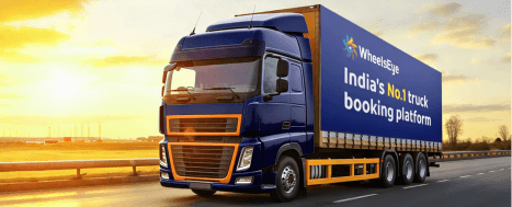 Truck driver on the road using the WheelsEye logistics marketplace
