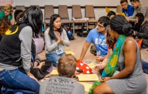 Girl teaching a group