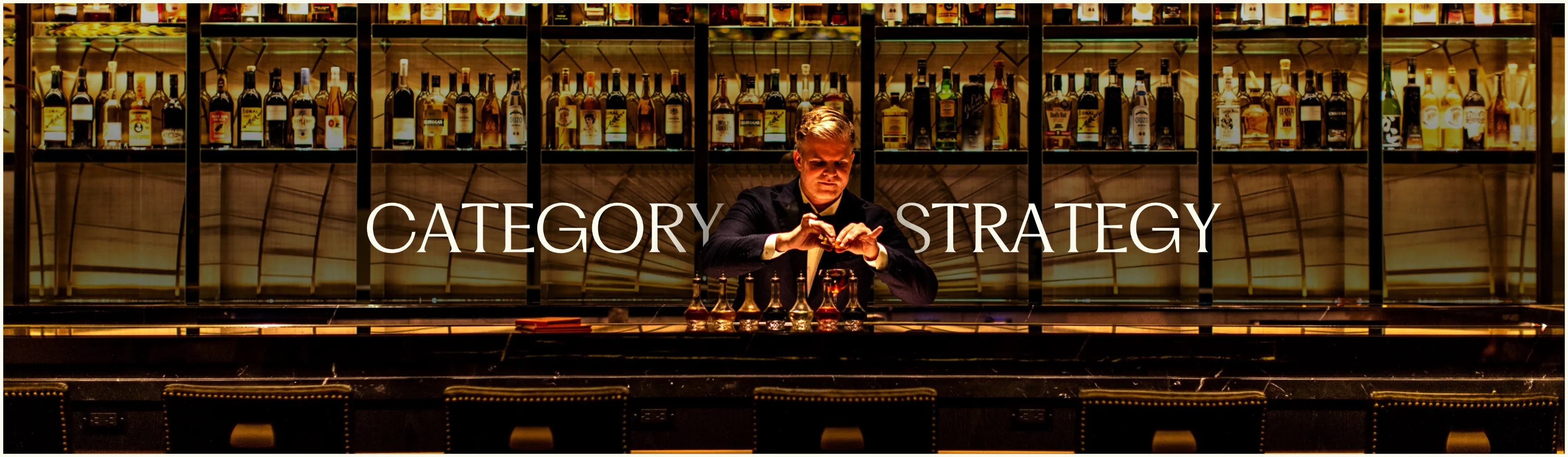 "Category Strategy" slide from the Hilton production with a photo of a bartender preparing cocktails at a hotel bar
