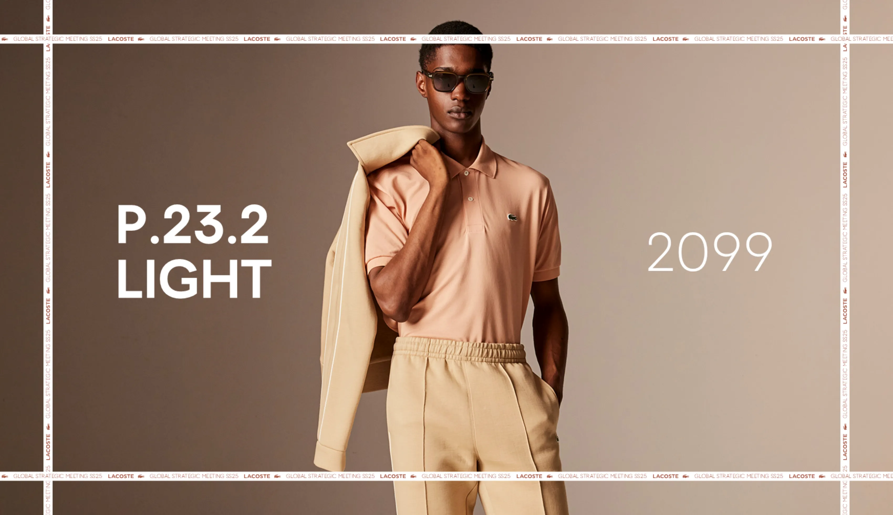 Lacoste GSM SS25 slide "P.23.2 Light," model wearing a salmon polo shirt and beige trousers.