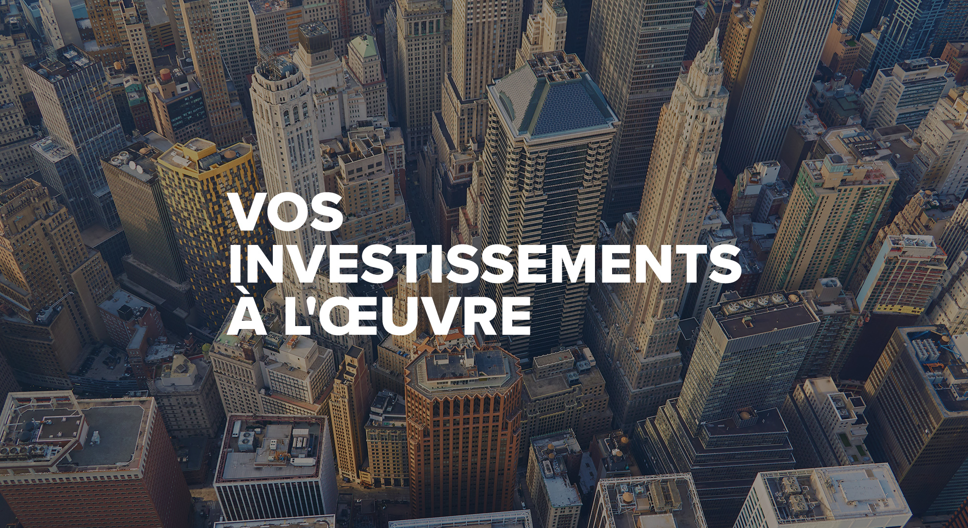Vos investissements à l’œuvre — vue aérienne d’un ensemble de gratte-ciel.