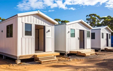 Fire-rated steel access door installed in a prefabricated modular building, compliant with AS1905.1 standards
