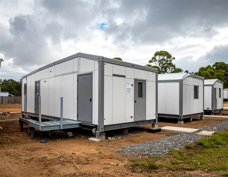 Modular portable buildings used as site offices on an Australian construction site, showing secure access doors
