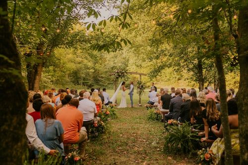 A beautiful forest wedding ceremony in a perfect wooded location at The Barn at Cedar Grove in Kentucky.