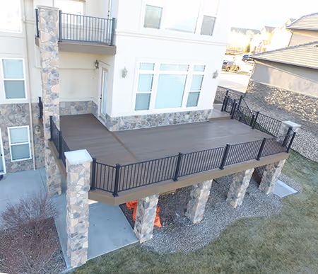 Custom Deck with railing and decorative stone columns