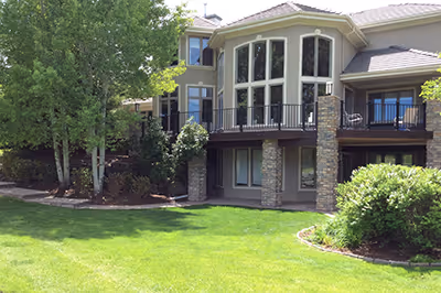 Partially Covered Custom Deck with  Decorative Stone Columns