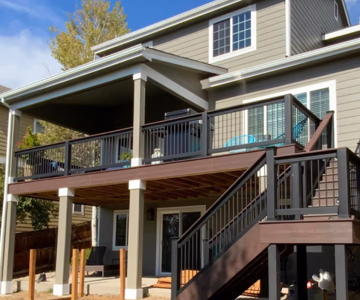 Custom Partially covered Upper Level Deck with Stairs with a landing