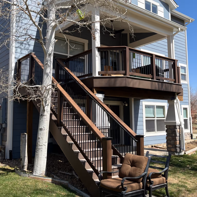 Upper Level Deck with standard stairs and wood and metal railings