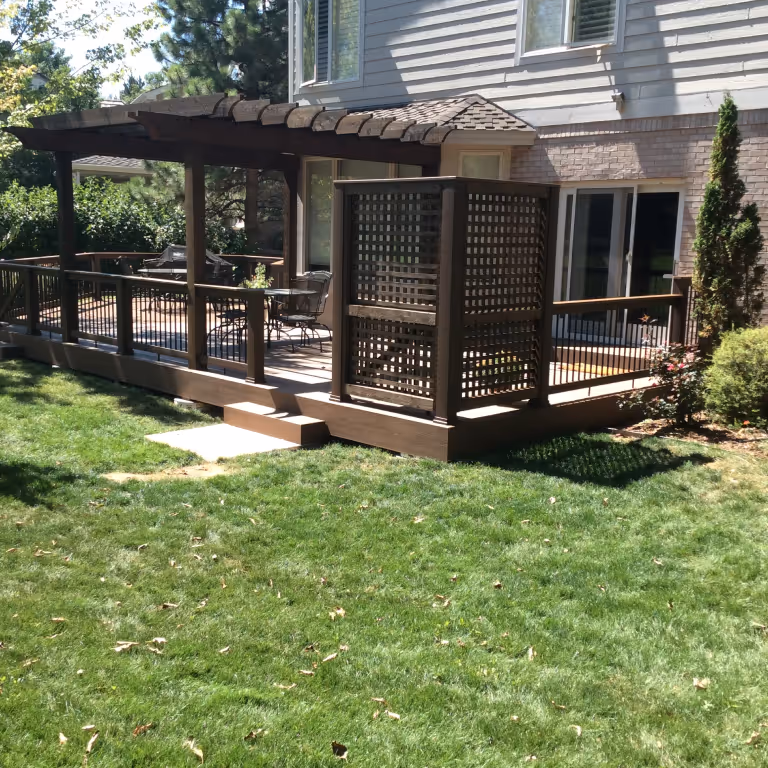 Pergola and Privacy Screen over a deck in Dark Brown Wood