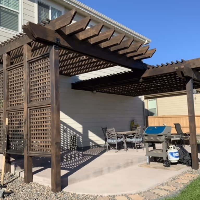 Dark Brown Pergola over a Concrete Patio