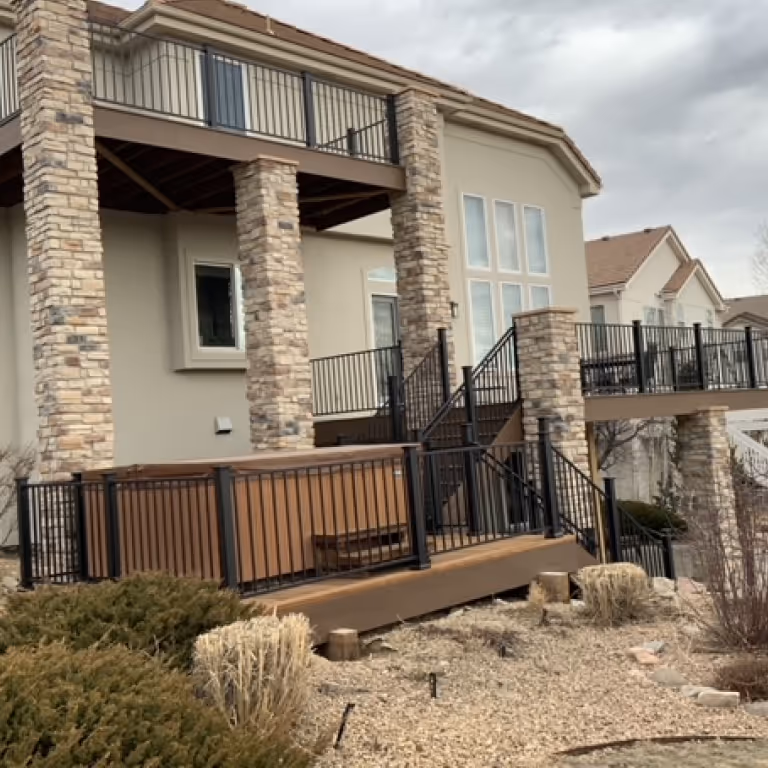 Decorative faux stone columns for deck post