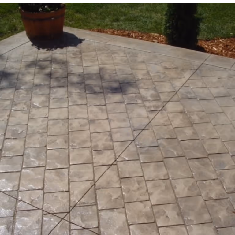 Gorgeous Decorative Stamped Concrete Patio with Stone design