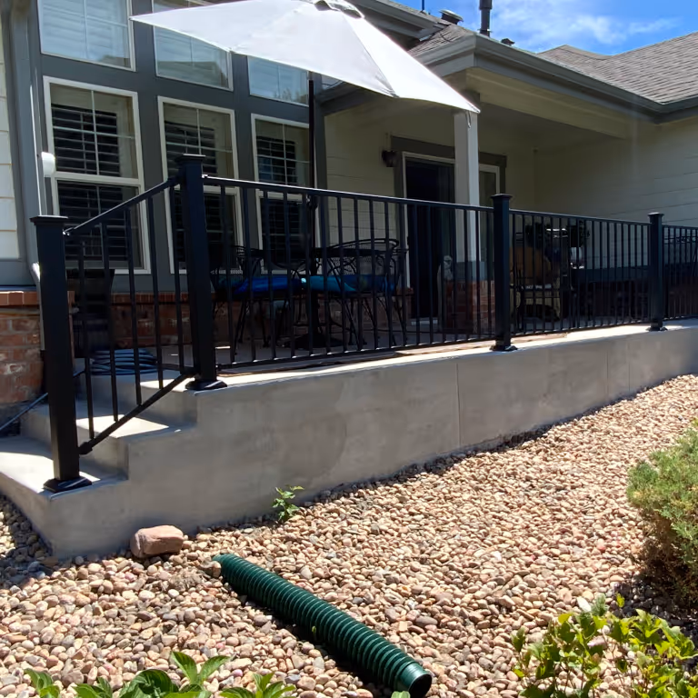 Standard Gray Concrete Patio with Stairs