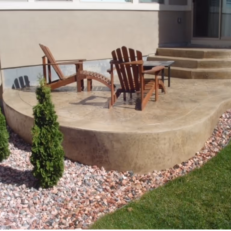 Small Tan Decorative Stamped Concrete Patio with Steps