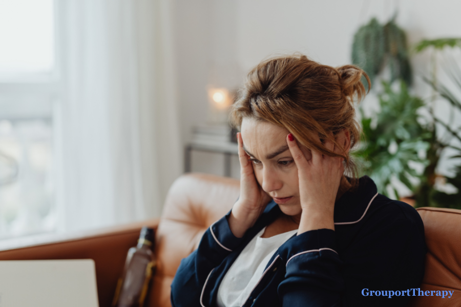 Woman experiencing emotional distress while seeking support through BPD therapy
