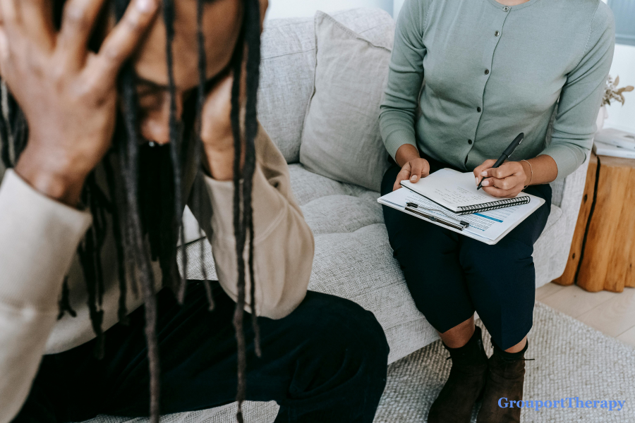 Therapist supporting a distressed person discussing BPD hypersexuality, impulsive behavior, shame, and relationship concerns.