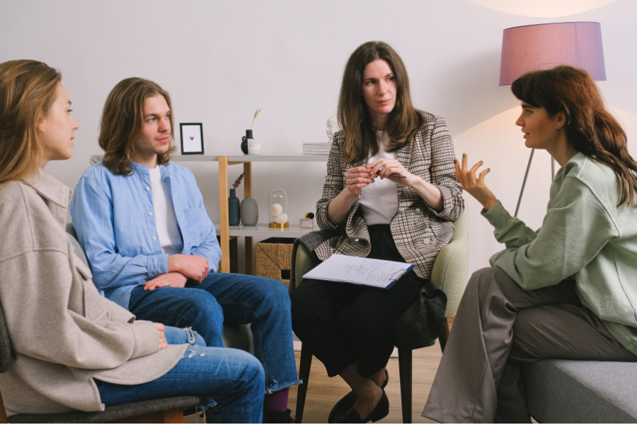 therapist giving therapy to a family