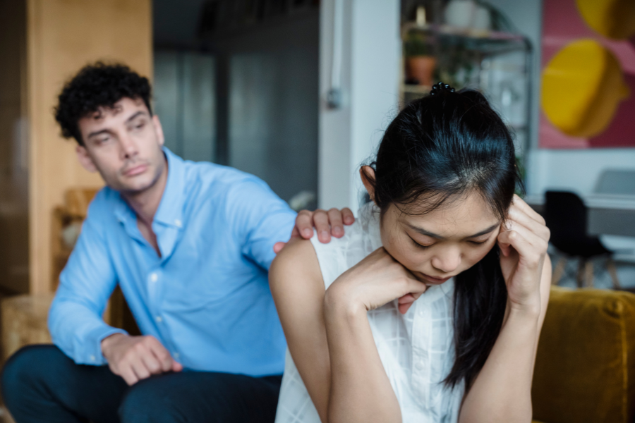 Woman experiencing emotional distress during relationship conflict, representing BPD triggers and emotional dysregulation