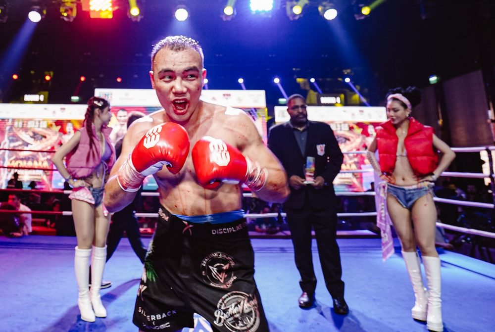 Vu Quang Vinh celebrates his TKO win at HOIANA Legendary